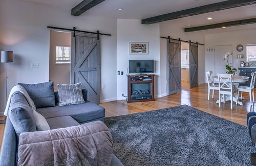 Talent Apartment | Two cottages with king bed bedrooms, dining area and full kitchen.