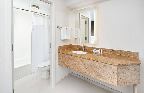 Southeast Houston Hotel | Two Family Ready Rooms w/Living Area, Pool, and Daily Free Breakfast