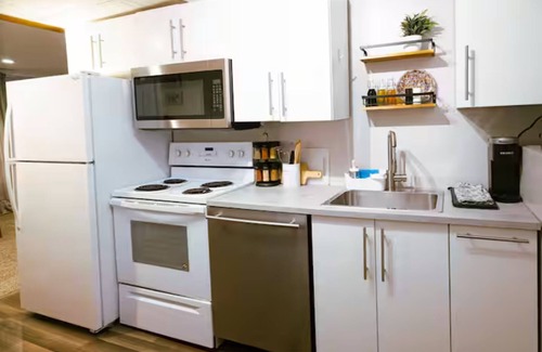 Taylorsville House | Two kitchens, patio, fenced backyard, and playground.