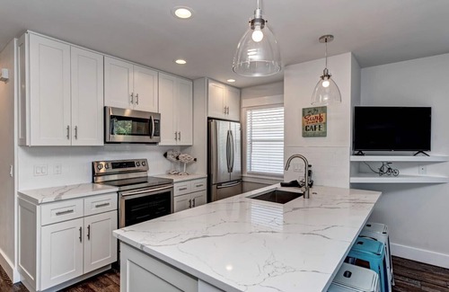Holmes Beach House | Two minute walk to beach! PRIVATE HEATED POOL w covered lanai. Great location!