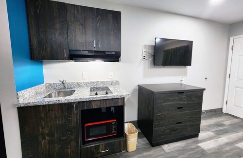 Wharton Hotel | Two Queen Beds Kitchenette Non-Smoking Room at Scottish Inns and Suites!