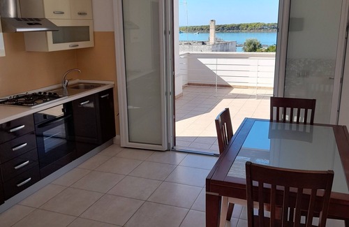 Porto Cesareo Apartment | two-room apartment Sea View, 30 mt. from the sea, 150 from the beach and 400 from the Center