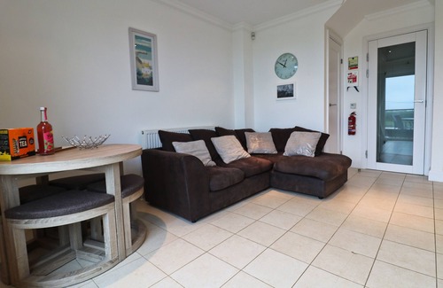Treyarnon Apartment | Two storey apartment with balcony and sea views opposite the beach