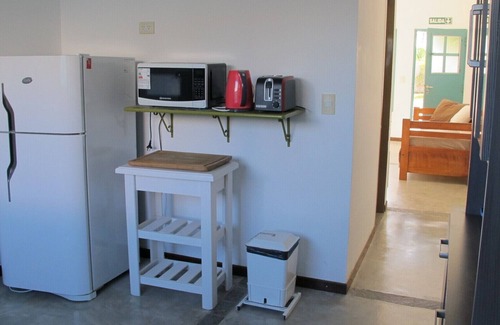Puerto Madryn Apartment | Two story apartment with all services and amenities. Nice neighbor