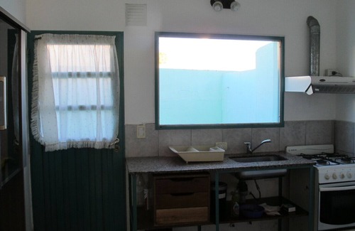 Puerto Madryn Apartment | Two story apartment with all services and amenities. Nice neighbor