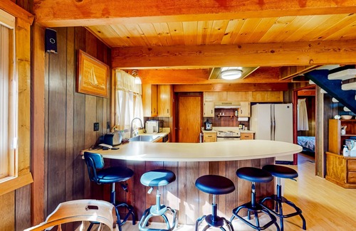 Comstock Acres Cabin | Two-story cabin with a wood fireplace, washer/dryer, & decks