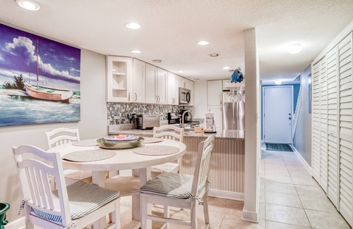 Crescent Beach Condo | Two-story condo with balcony, WiFi, W/D, AC, 2 pools, & tennis - steps to beach