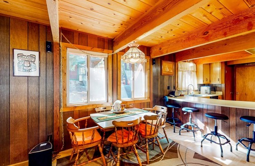 Comstock Acres Cabin | Two-story dog-friendly cabin with a wood fireplace, washer/dryer, & decks