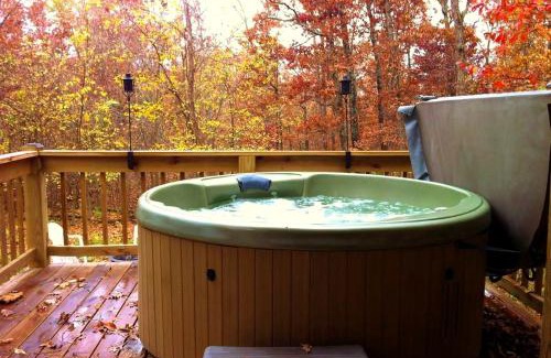 Steelville House | Two-Story Log Cabin Rental with a Hot Tub near Upper Meramec River, Missouri