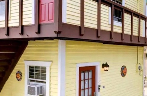 San Jacinto House | Two Story Yellow home