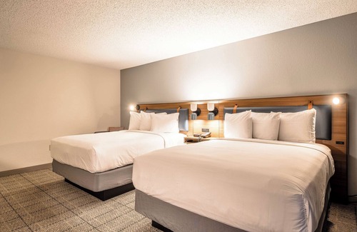 Richardson Hotel | Two Units Just Minutes Away From Eagle Stadium, w/FREE Parking & Outdoor Pool!