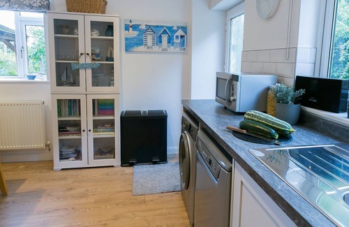 Pentraeth Apartment | Ty'r Ardd - a ground floor bedroom that sleeps 7 guests in 4 bedrooms