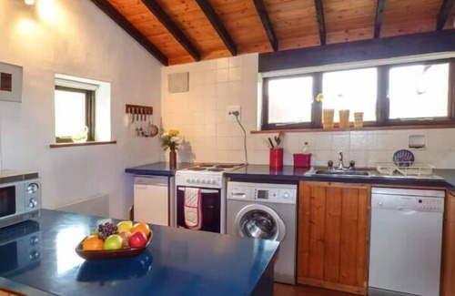 Cwmtirmynach Cottage | TY UCHAF, character holiday cottage, with open fire in Llangwm