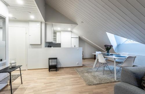 Downtown Kuopio Apartment | Tyylikäs ja tilava kattohuoneisto ydinkeskustassa