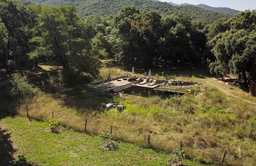 Petreto-Bicchisano House | U Pratu, bungalows surrounded by nature, natural pool and organic garden