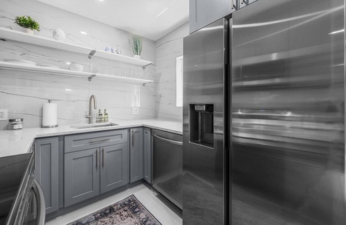 Downtown Fort Lauderdale Apartment | Uhost AI 1BR With Marble Accents Patio