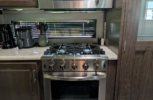 North Fort Myers House | Ultimate Comfort! Rent Our Grand Design Solitude 373FB-R 5th Wheel Camper!