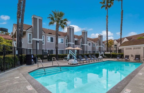 Downtown Village House | Ultimate Vacation! Family-friendly Unit w/ Kitchen! Onsite Pool & Pets Allowed!