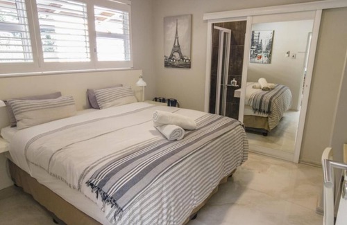 La Lucia House | Umhlanga Lodge Room leads of a shared kitchenette and dining room