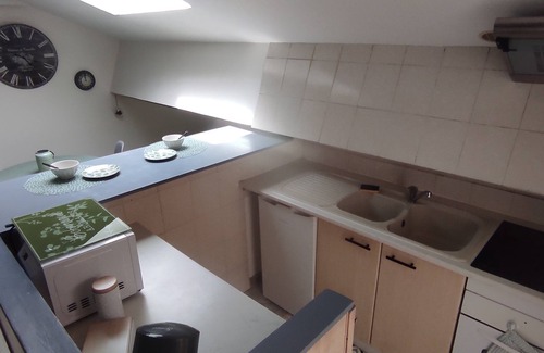 Maraussan Apartment | Under the roof