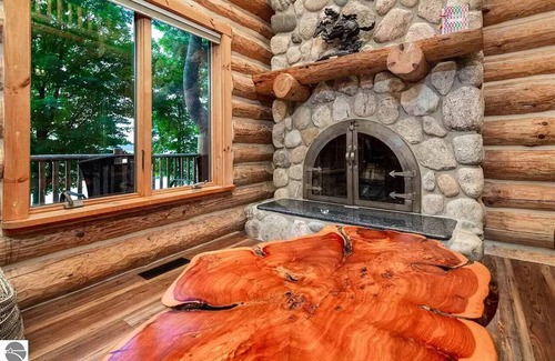 Suttons Bay Cabin | Unforgettable Log Cabin Experience: Family-owned, Lakefront, Private Beach