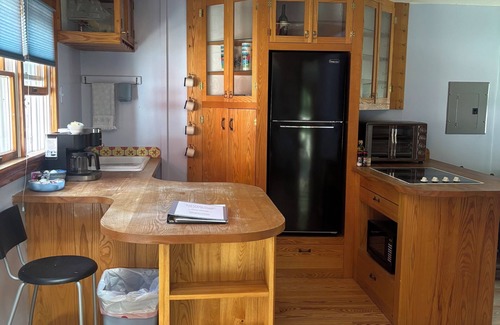 Kennebunkport Apartment | Unique apartment with intricate woodwork and spiral staircase. 5 miles to beach!