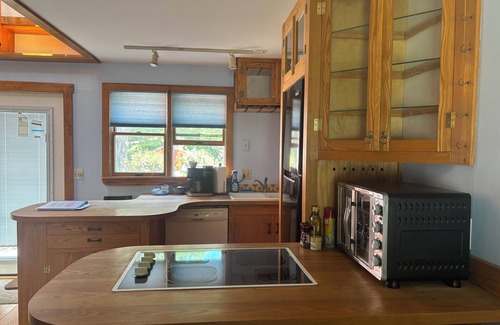 Kennebunkport Apartment | Unique apartment with intricate woodwork and spiral staircase. 5 miles to beach!