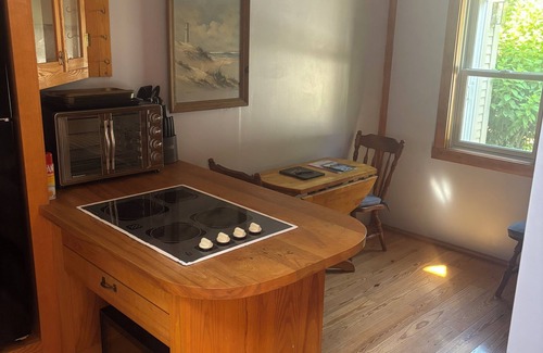 Kennebunkport Apartment | Unique apartment with intricate woodwork and spiral staircase. 5 miles to beach!