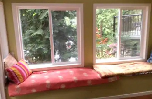 Shawnigan Lake Cottage | Unique Hand built log cottage on the lake with views and hot tub.