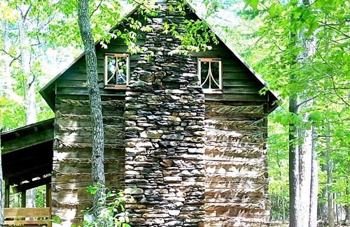 Huddleston Cabin | Unique Historical log cabin with private beach and 300 ft. of waterfrontage.