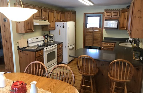 Pepin House | Unique in the Woods Cabin - at the edge of the beautiful village of Pepin, WI.
