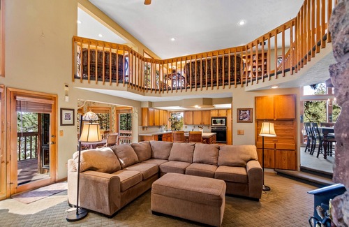 Liberty Lake House | Unique lakefront hideaway with four decks, dock, private hot tub & wood stove