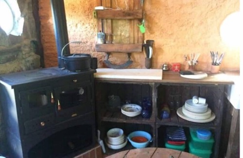 Villa Minozzo Cabin | Unique offgrid forest cabin, hand built using recycled materials.