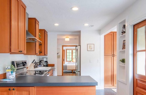 Neahkahnie Beach House | Unique one level home with a european feel. Fenced yard, hot tub and a short distance to the beach!