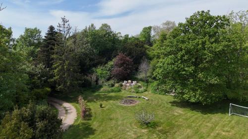 Merston House | Unique & Rural Child Friendly Annexe with Large Gardens, Games & Tennis Court - Chichester Holiday Properties