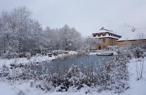 Bastheim Apartment | Unique vacation apartment with a view over the monastery grounds and the romantic garden (60sqm)