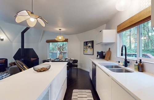 Burley House | Unique waterfront home with sauna, hot tub, and washer & dryer