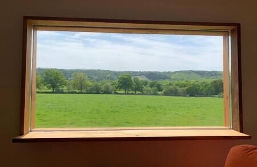 Graffham Cabin | Unique Wooden Cabin with outdoor bath and private field. Sleeps 4