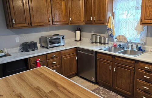 Owensboro House | Uniquely remodeled 3 bdrm 1 bth home in safe area! Fenced in with a large deck!