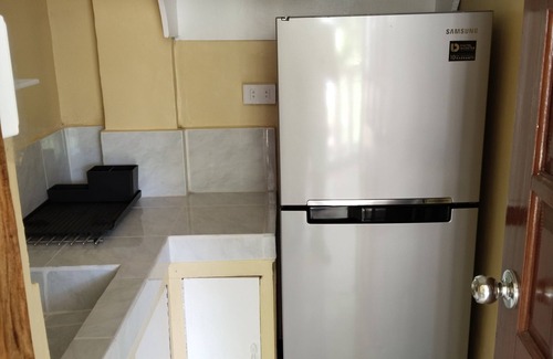 Yumbing Condo | UNIT 1-Ground Floor-Holds 4pax Fully furnished kitchen, hot & cold showers.