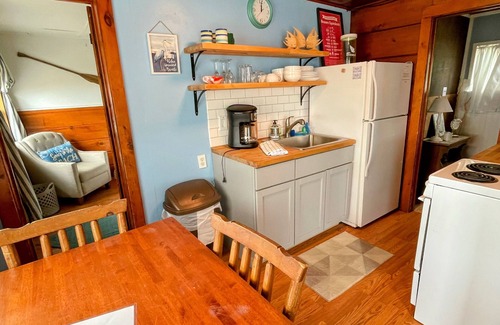 Oscoda Resort | Unit #2-The Lazy Fish one queen bed, full bathroom and renovated kitchen.