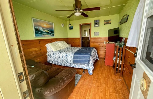 Northeastern Michigan Resort | Unit #3-The Lazy Fish- Stand alone motel room type cabin on the beach!