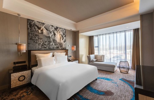 Xinshi District Hotel | Universal Hotel Urumqi