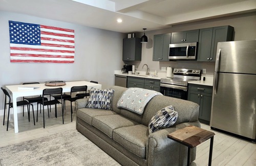 Mancelona Condo | Unpack and relax with a Mountain view. New! Sleeps 6 Pools, New construction.