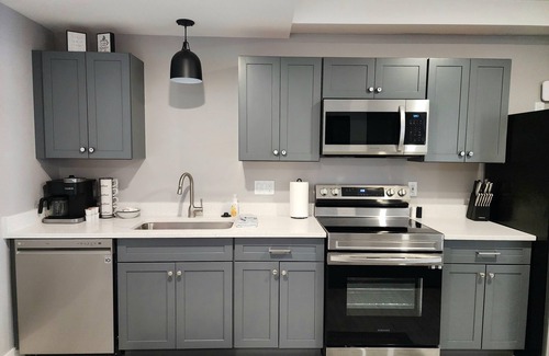 Mancelona Condo | Unpack and relax with a Mountain view. New! Sleeps 6 Pools, New construction.