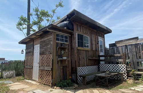 Broad Channel Cabin | Unplug and unwind in nature’s peace at The Drift Marsh — your off-grid escape