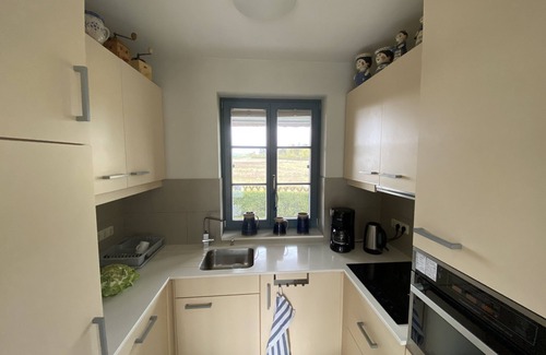 Kamminke House | 'Uns Hus' with terrace and small garden; Wlan; Internet-TV close to the beach and quiet