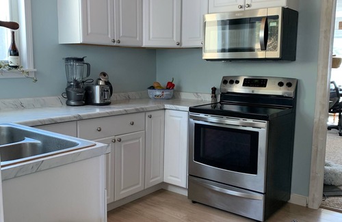 Brimley Cabin | UP lakefront cabin on warm inland lake across the street from Lake Superior