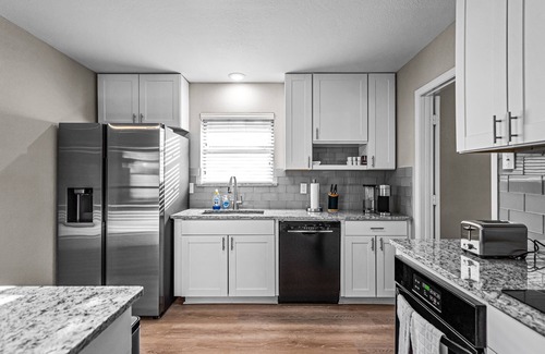 Southwest Carrollton House | Updated and centrally located home with attached garage.
