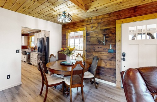 Hendersonville Cabin | Updated and peaceful home with open layout, fireplace, streaming, deck, AC